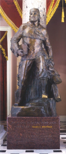 A statue of a man in native dress.